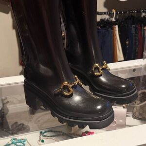 Gucci Glossy Black Boots with Gold Buckle